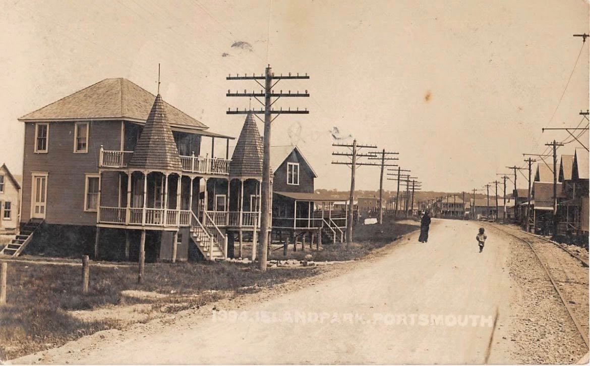 Historic photograph of an Island Park street with elevated houses and rail tracks, Portsmouth